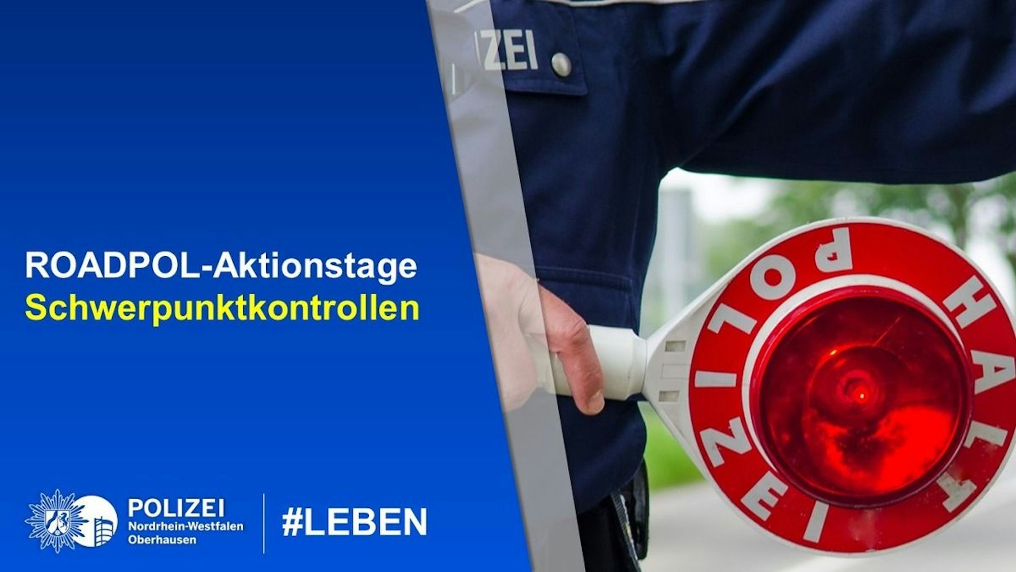 Ein Polizeiauto bei einer Verkehrskontrolle.