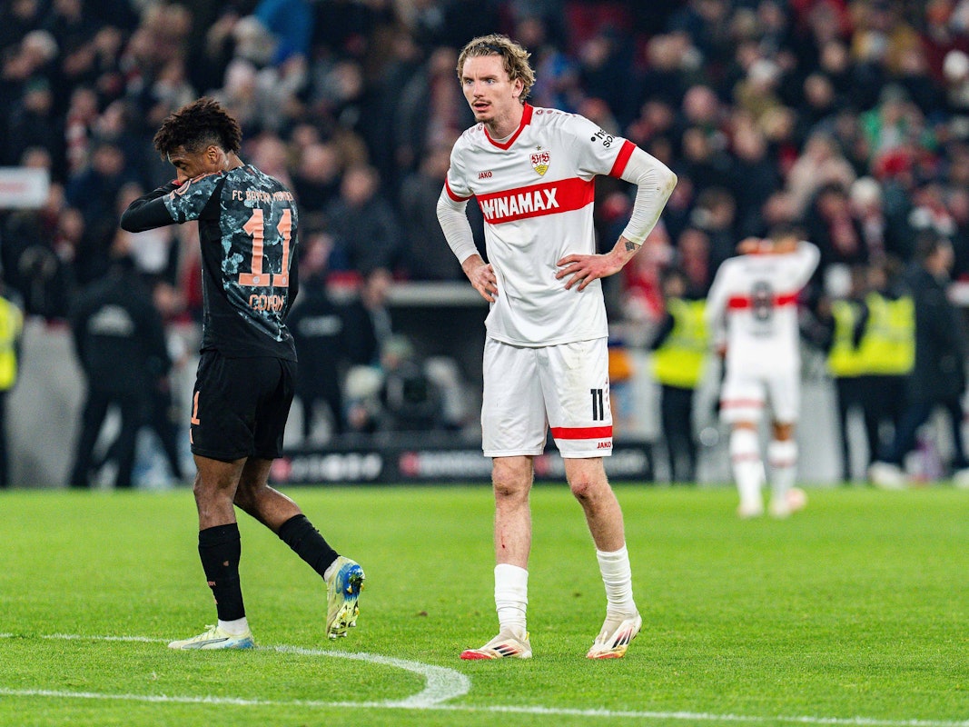 Coman und Woltemade stehen im Spiel nebeneinander