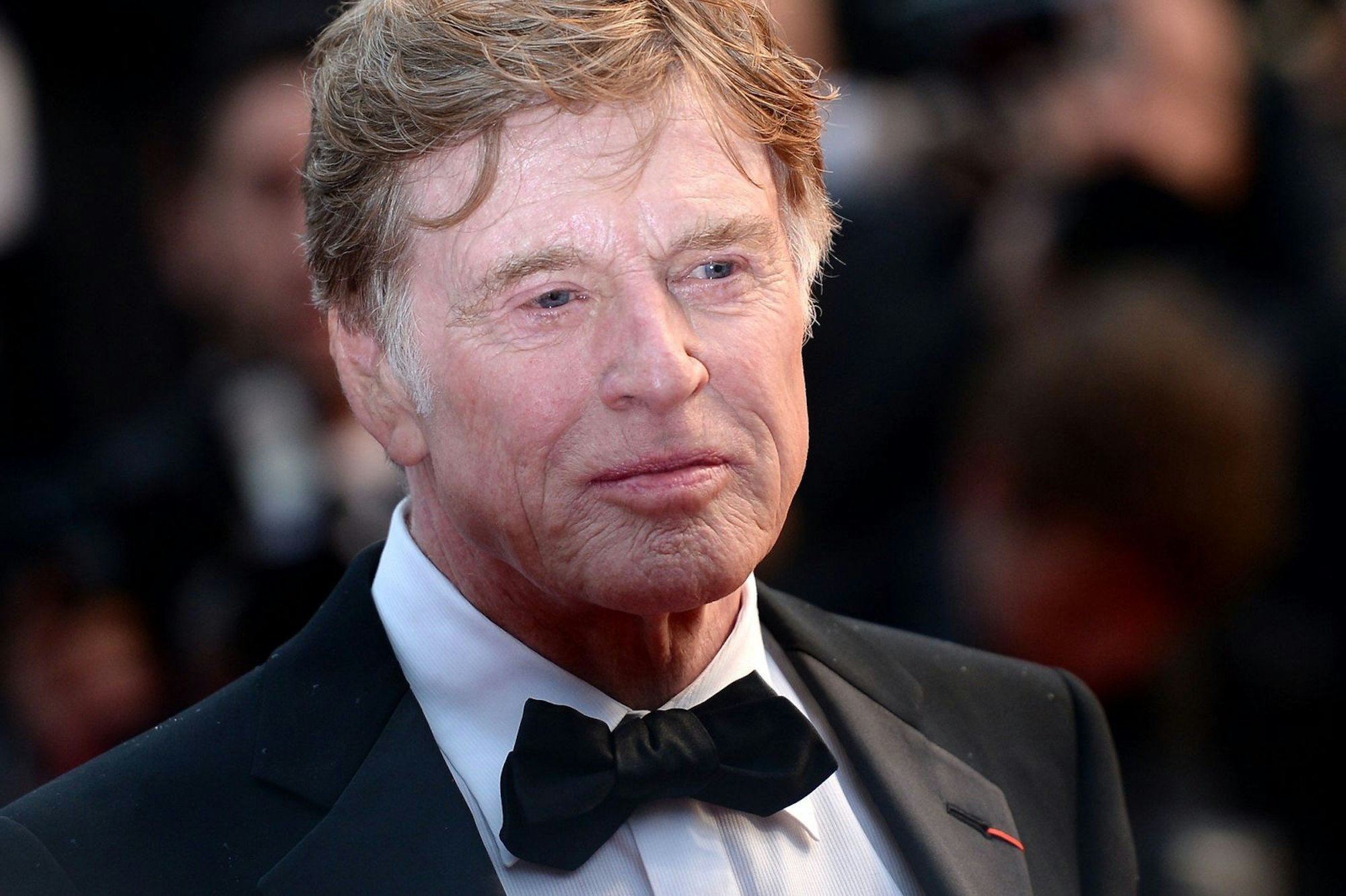Auch im Alter von bald 80 Jahren steht Robert Redford noch regelmäßig vor und manchmal auch hinter der Kamera. (Bild: Michael Buckner/Getty Images)