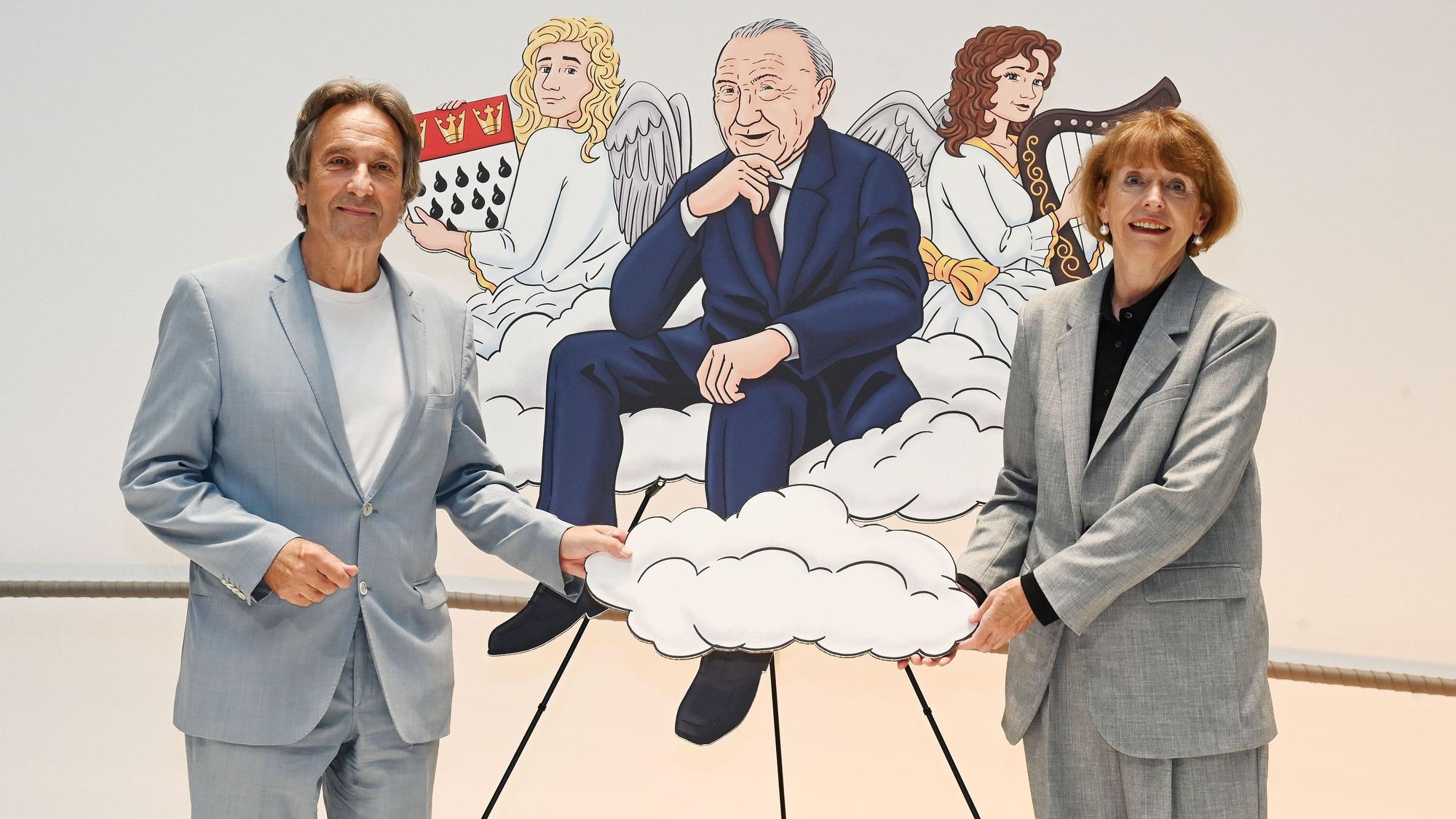 Jürgen Nimptsch und Oberbürgermeisterin Henriette Reker an einem Bild von Konrad Adenauer.