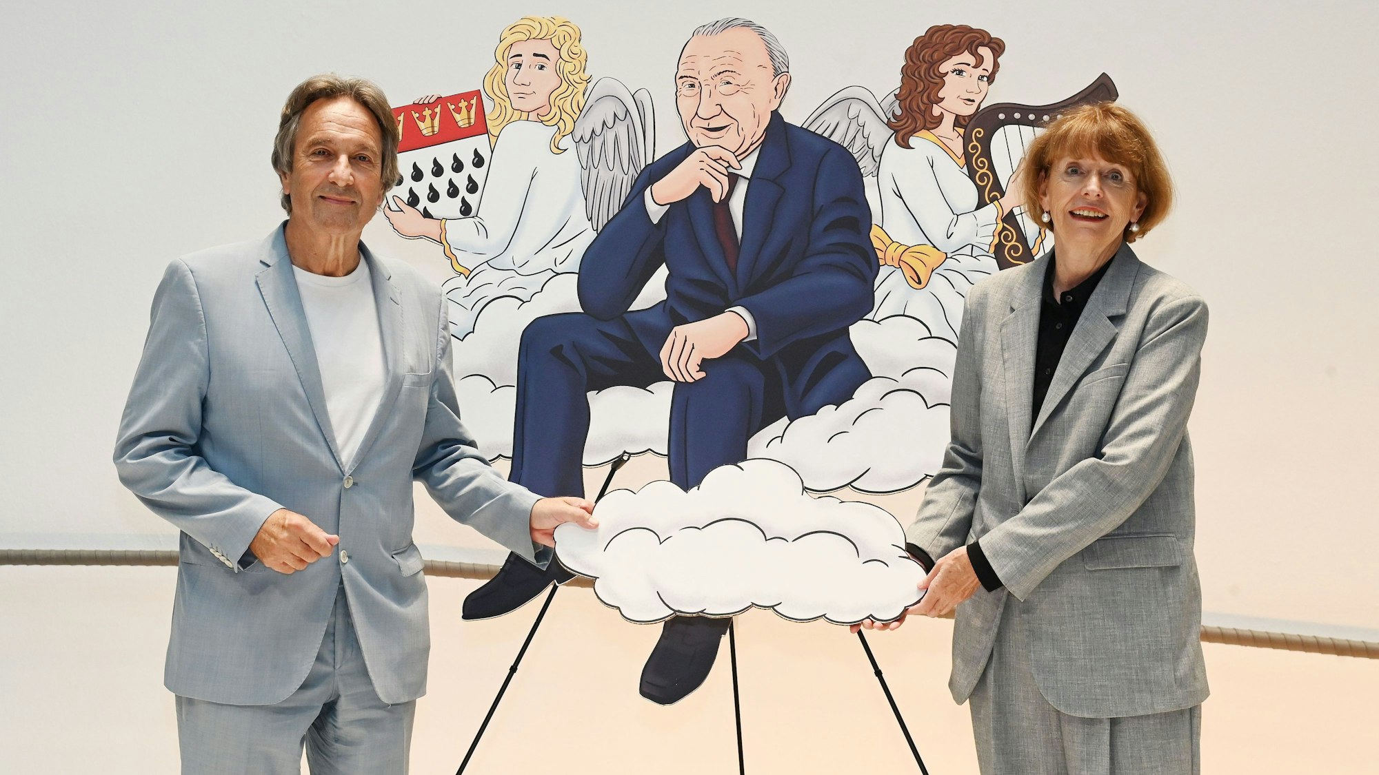 Jürgen Nimptsch und Oberbürgermeisterin Henriette Reker an einem Bild von Konrad Adenauer.
