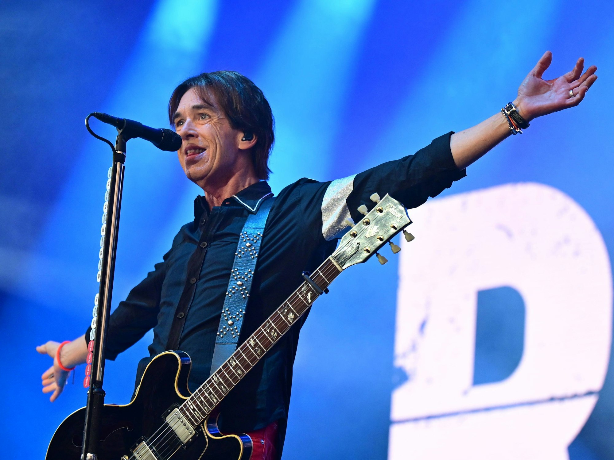 Per Gessle von Roxette beim Konzert auf der Bühne.