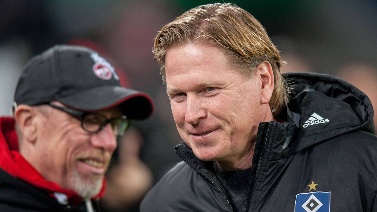 Markus Gisdol und Peter Stöger lachen.