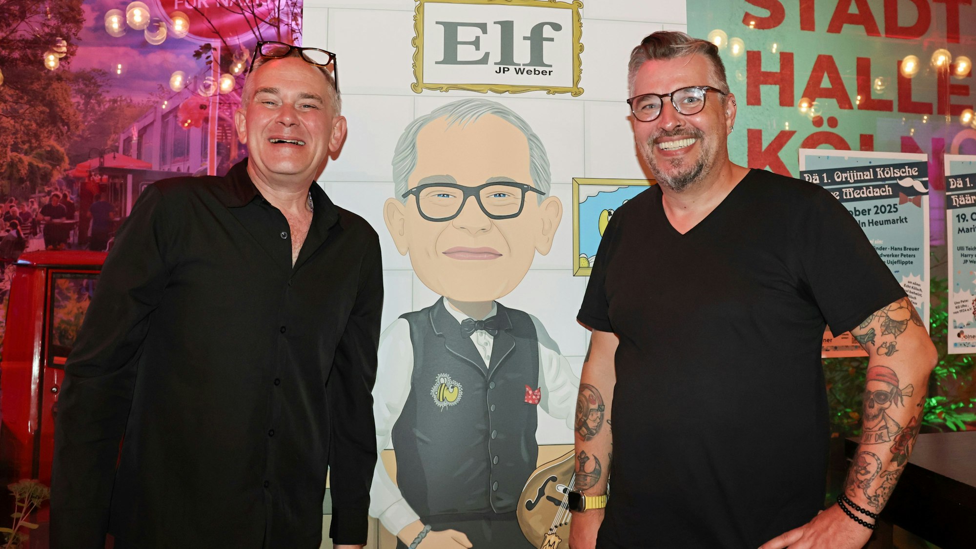 JP Weber (l.) zusammen mit dem Künstler und Illustrator Don Lorenzo, der das Album-Cover von „Elf“ gestaltet hat.
