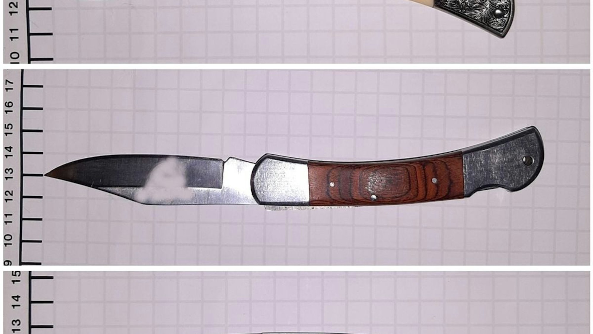 Ein von der Polizei beschlagnahmtes Messer liegt auf dem Boden.