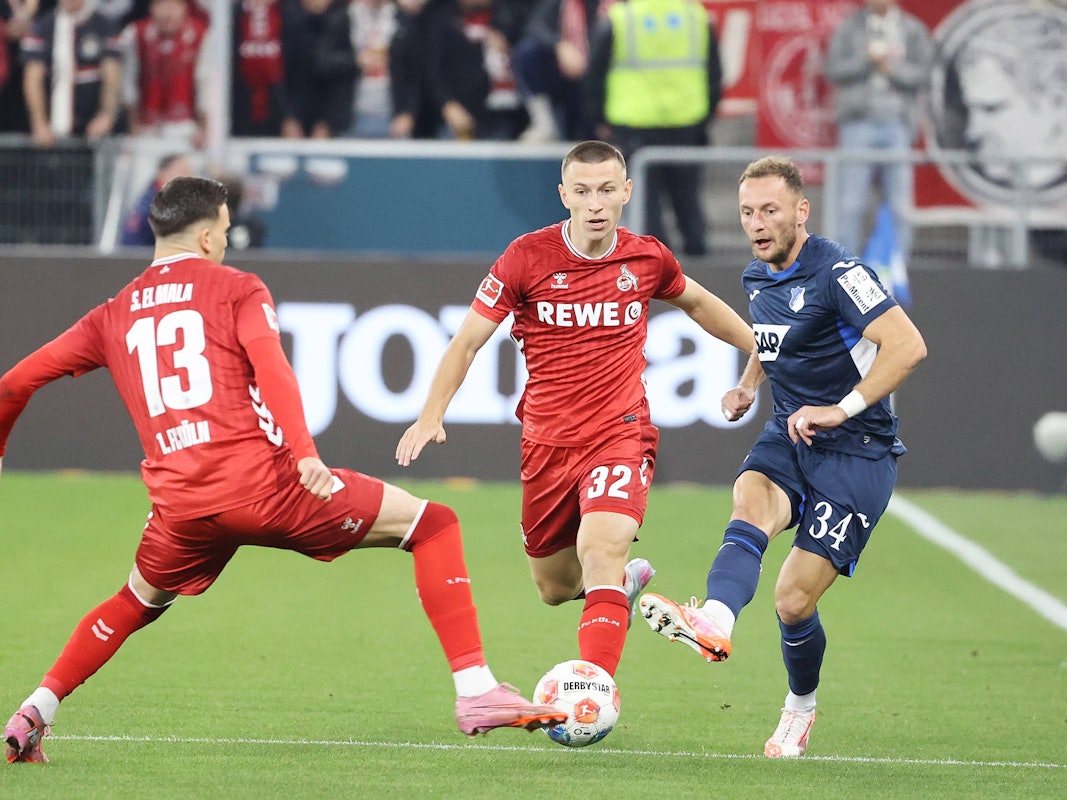 Kölns Said El Mala und Kristoffer Lund gegen Hoffenheims Vladimir Coufal.