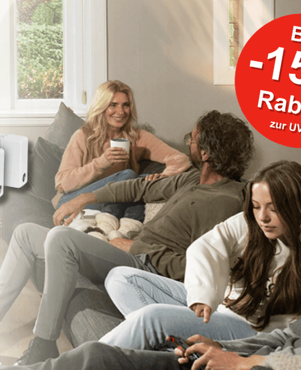 Eine Familie die ihren SpeedComfort Heizkörper Ventilator Zuhause nutzt.