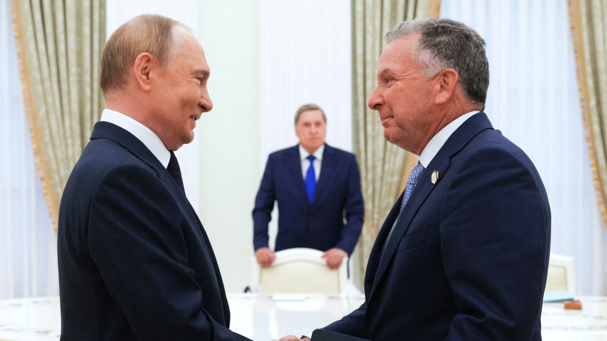 In this pool photograph distributed by the Russian state agency Sputnik, Russia's President Vladimir Putin greets US Special Envoy Steve Witkoff prior to their talks in Moscow on August 6, 2025. (Photo by Gavriil Grigorov / POOL / AFP)