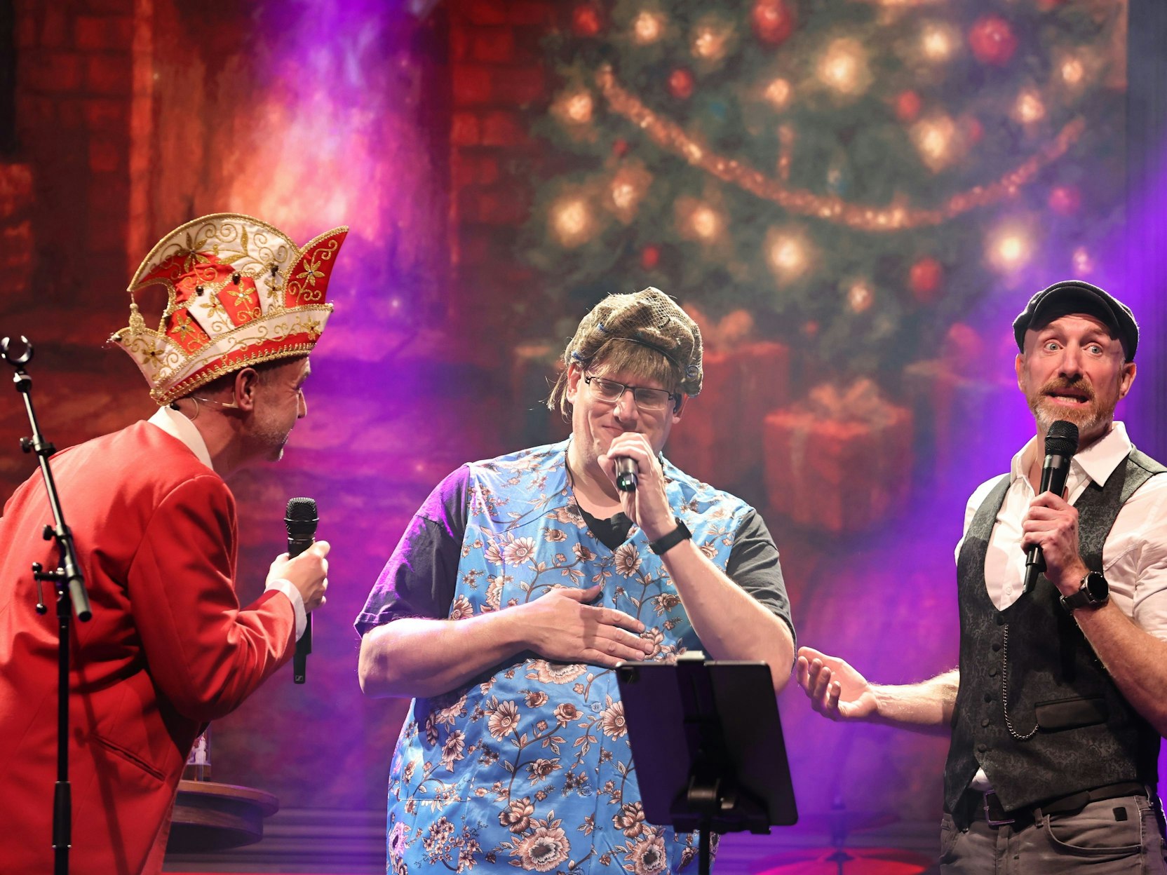 Volker Weininger, Michael Knipprath und Martin Schopps auf der Bühne.