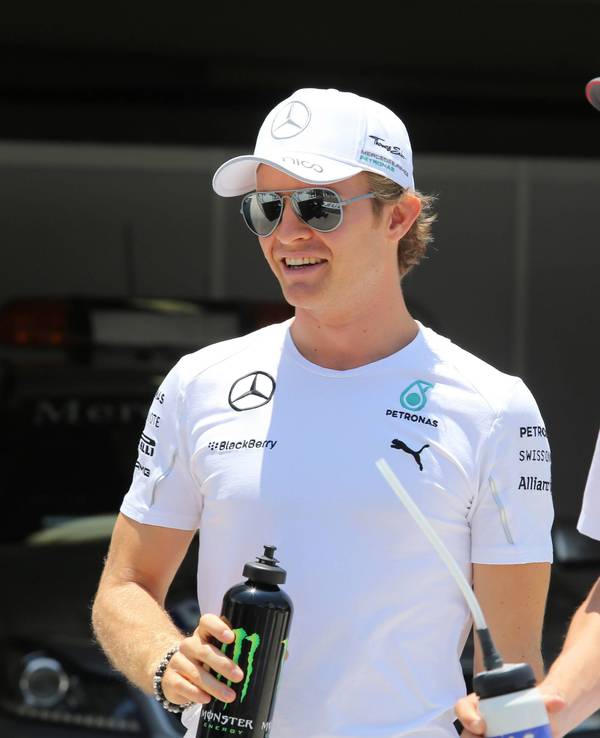 Nico Rosberg und Adrian Sutil (r.) stehen an der Strecke in Brasilien.