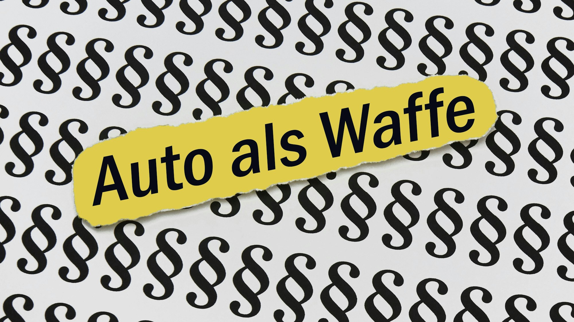 Paragraphsymbole mit dem Text "Auto als Waffe"