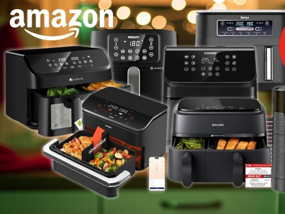 Airfryer von Cosori, Ninja, Russell Hobbs, Philips vor einer leicht beleuchteten, weihnachtlichen Küche.
