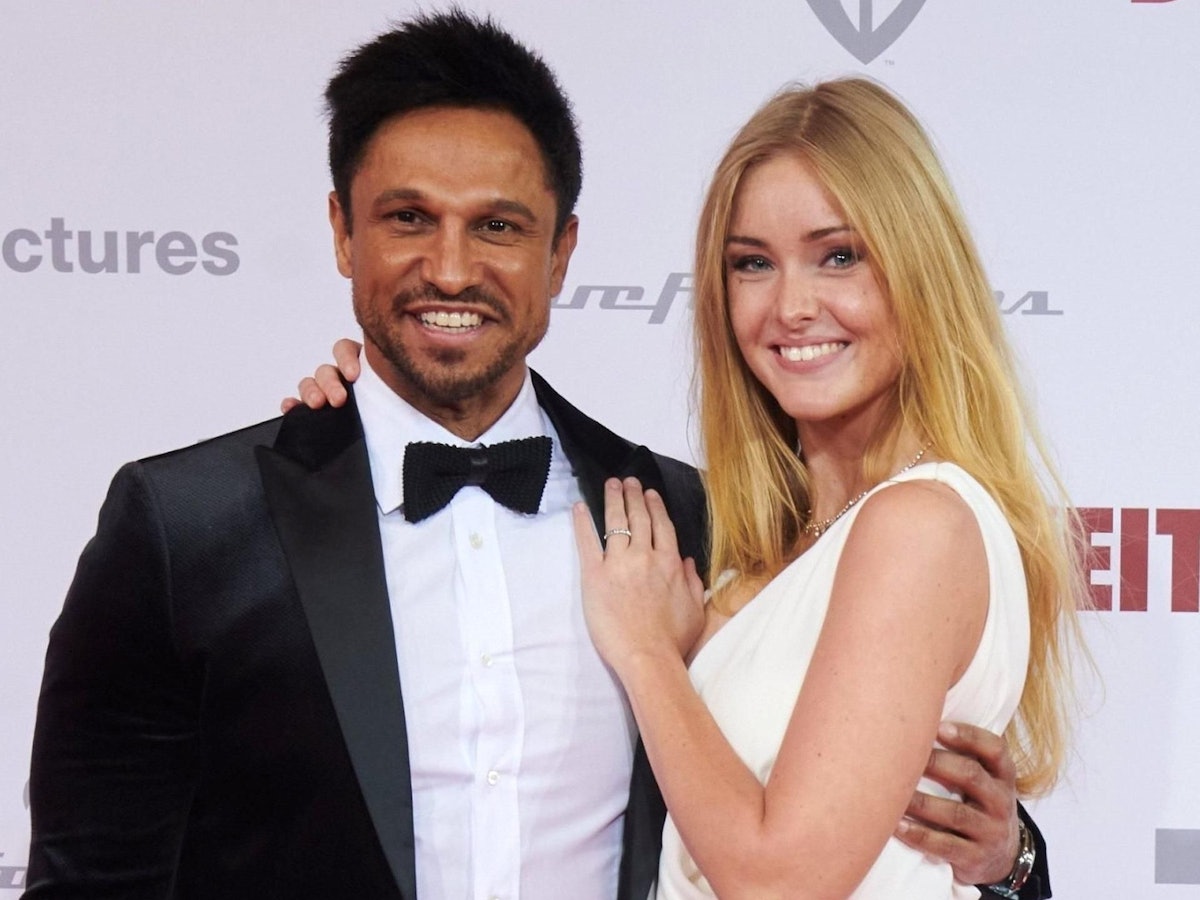 Fernsehmoderator Daniel Aminati und seine Frau Patrice umarmen sich.