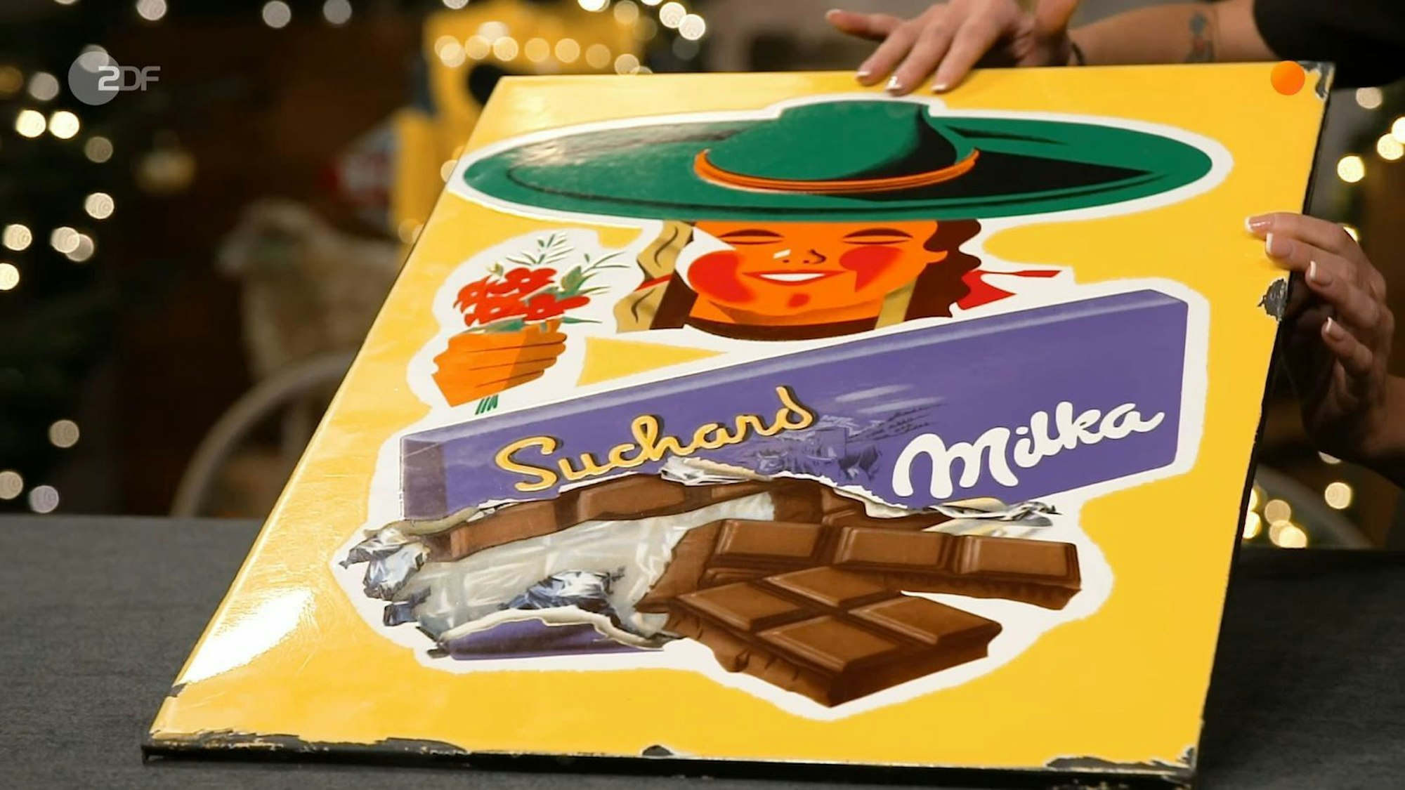 Ebenfalls verkauft wurde das Milka-Werbeschild aus den 1950er oder 60er Jahren.
(Bild: ZDF)
