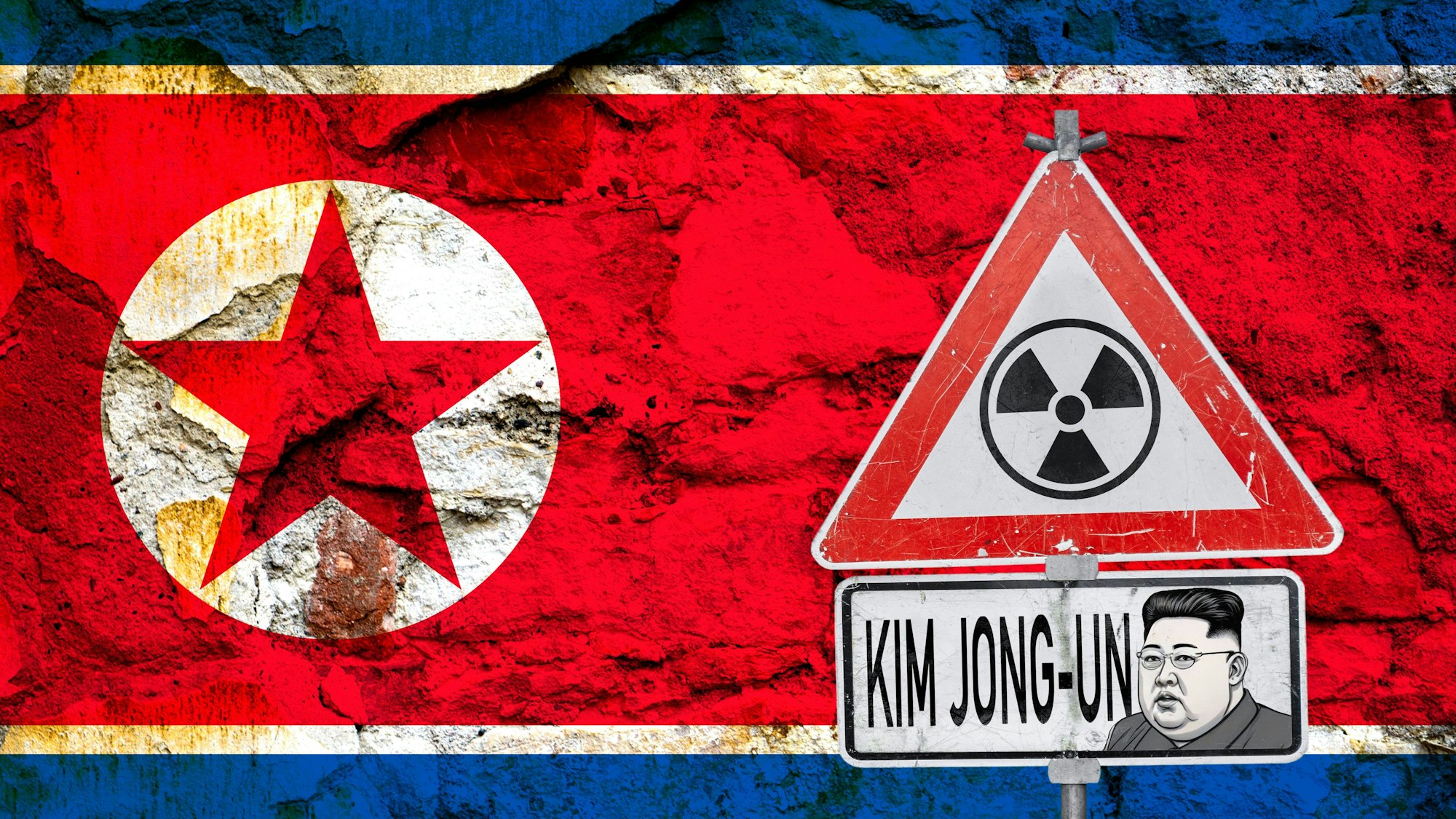 Flagge Nordkoreas mit Atomwarnschild und Kim Jong-un
