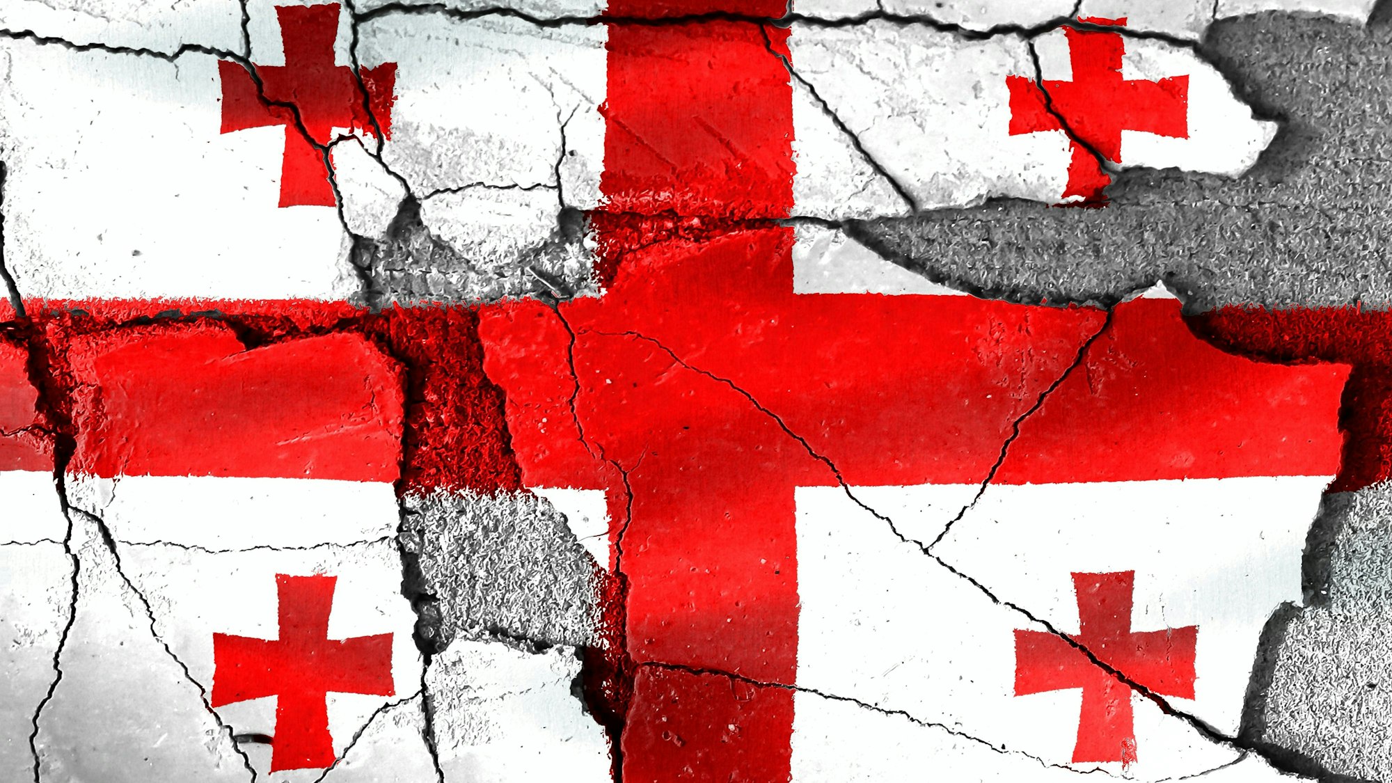Georgische Flagge auf rissiger Wand
