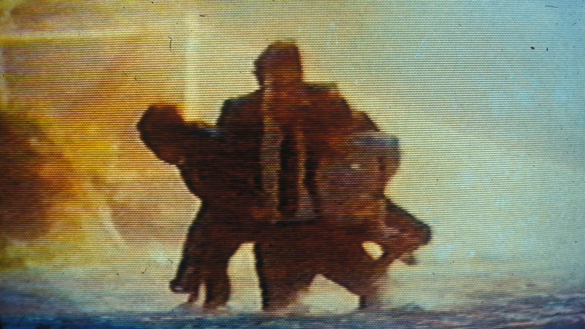 Vic Morrow hält die beiden Kinderdarsteller Renee Shin-Yi Chen und Myca Dinh Le im Arm.