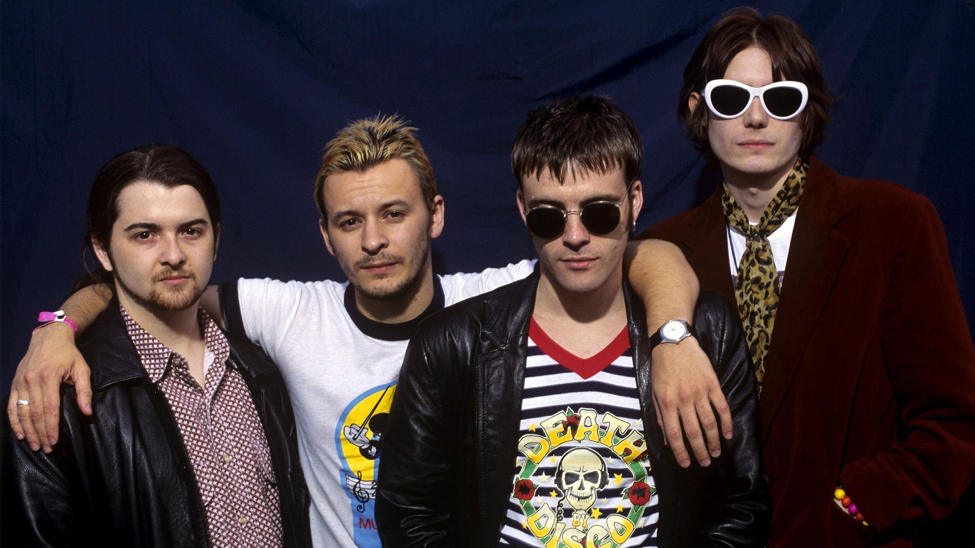 James Dean Bradfield, Nicky Wire, Richey Edwards und Sean Moore posieren.