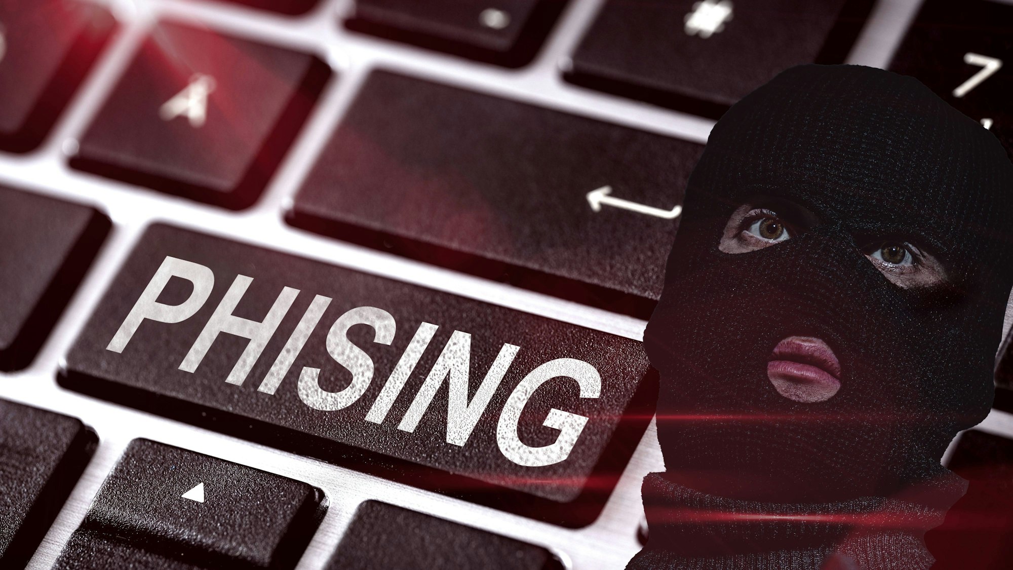 Maskierte Person und Phishing-Tastatur