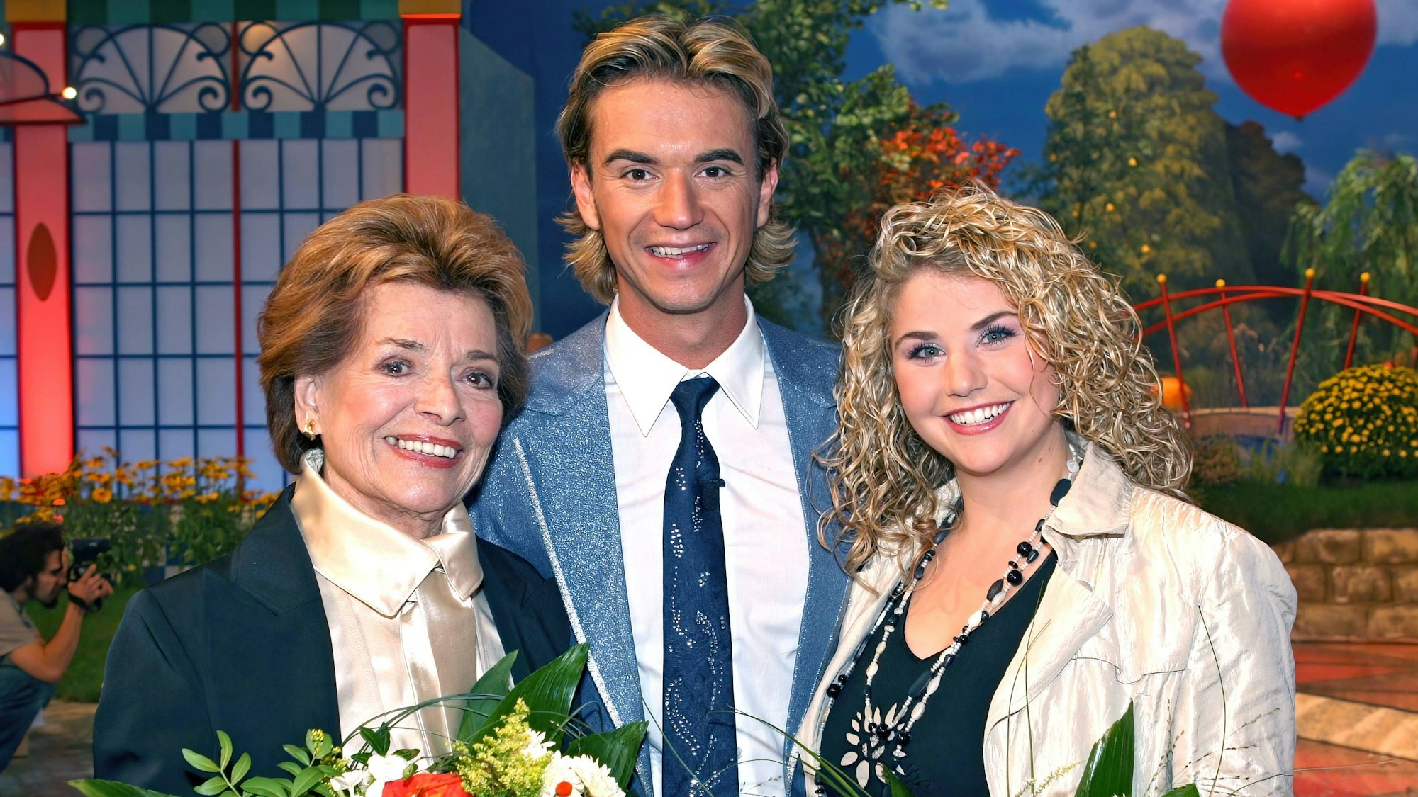 Florian Silbereisen mit Lys Assia und Beatrice Egli bei der ARD-Fernsehshow „Herbstfest der Volksmusik“ im Jahr 2007.