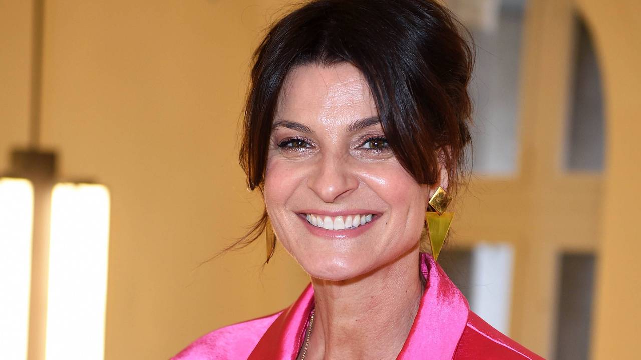 Marlene Lufen lächelt in pinker Oberbekleidung