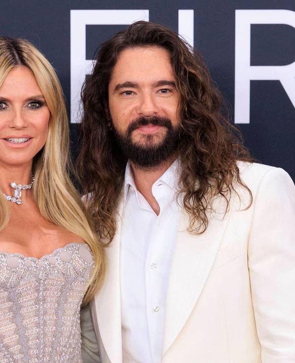 Heidi Klum und Tom Kaulitz posieren.
