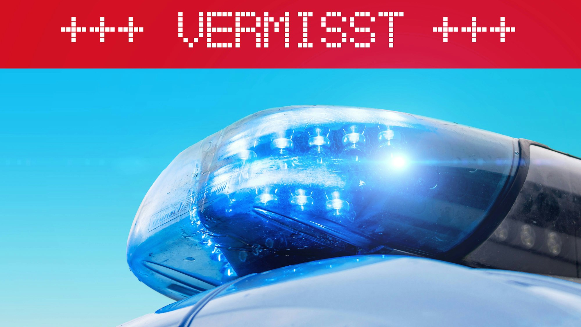 Polizei-Blaulicht und „Vermisst“-Schriftzug