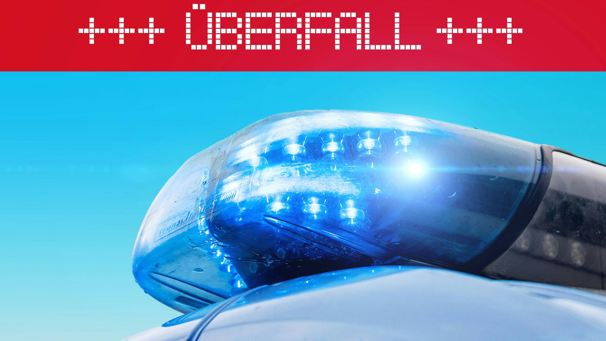 Warnbanner mit „Überfall“ und Blaulicht