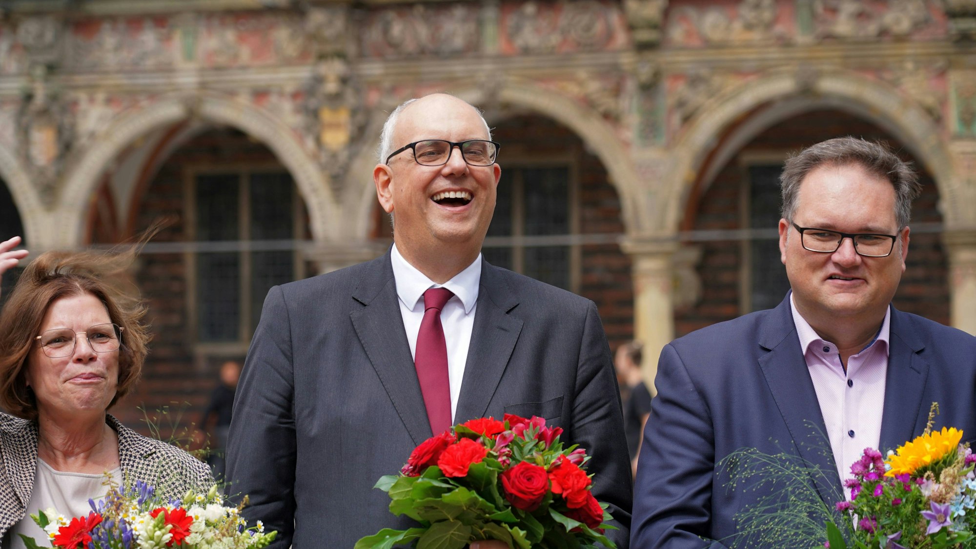 Kristina Vogt, Andreas Bovenschulte und ein Mann