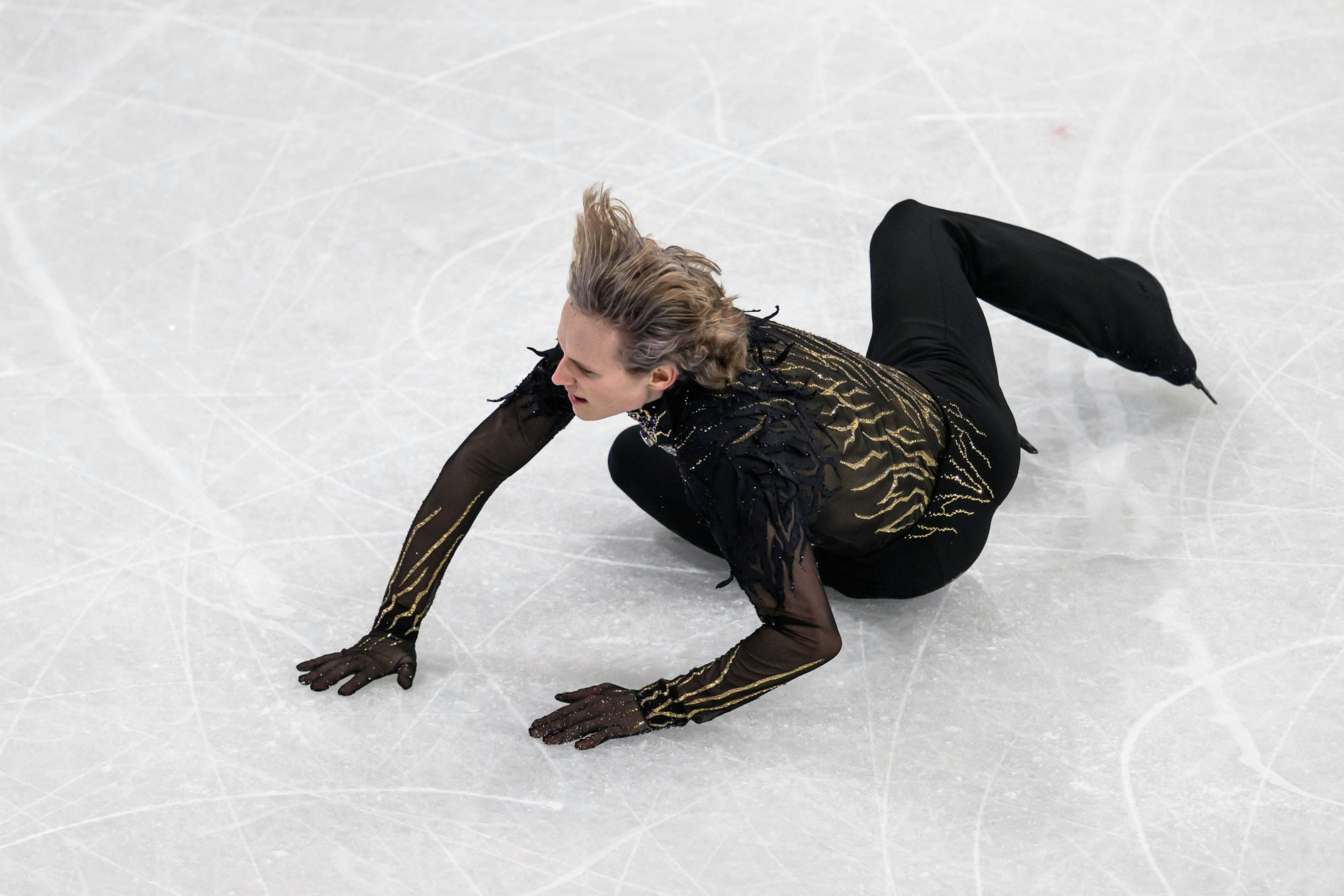 llia Malinin stürzt bei einen Sprung.