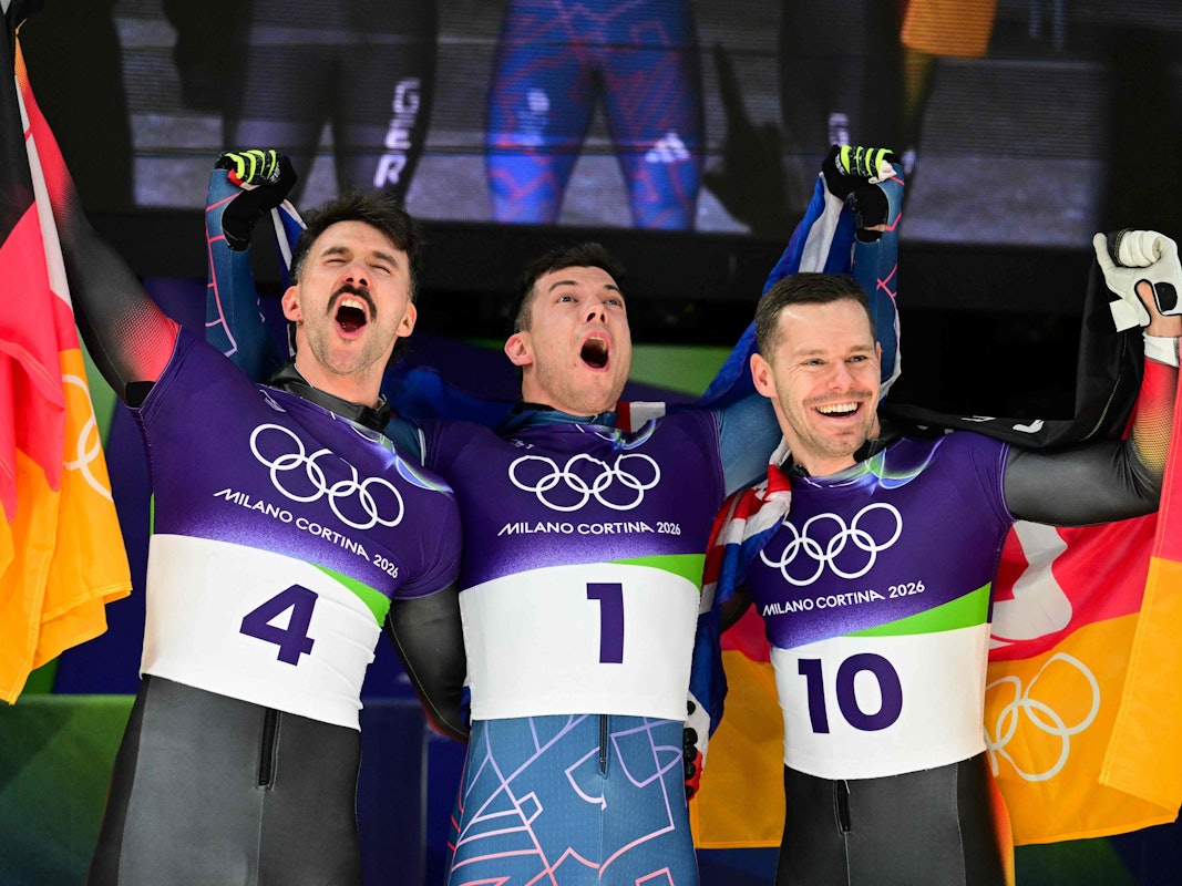 Axel Jungk, Matt Weston und Christopher Grotheer jubeln gemeinsam.