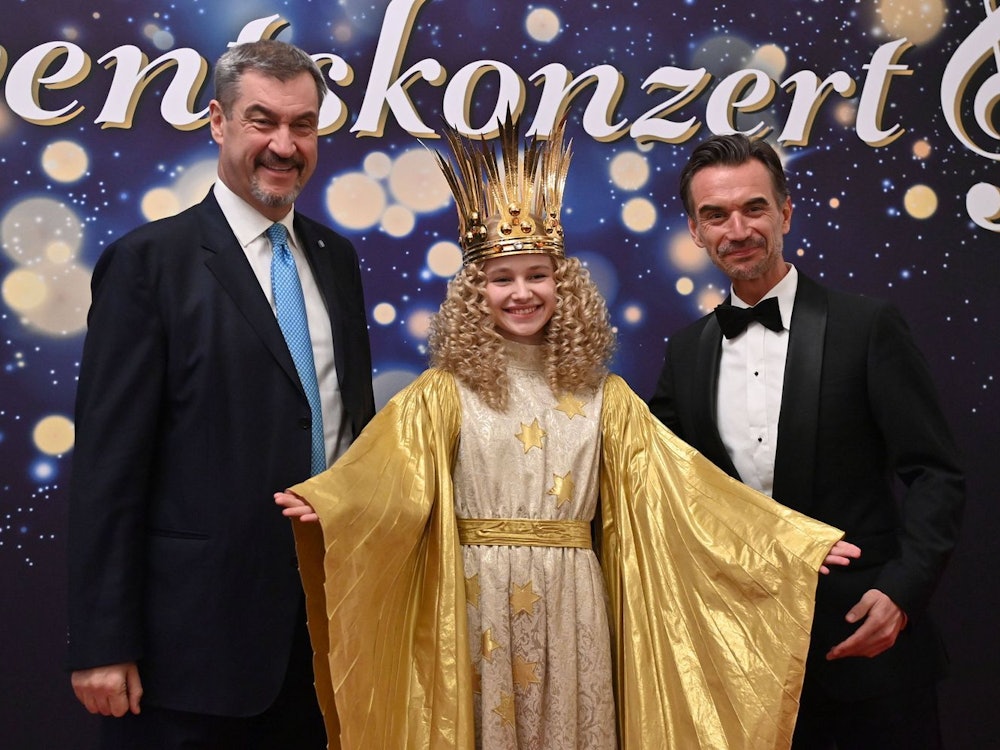 Markus Söder (links) und Florian Silbereisen feierten 2025 ein „Adventskonzert“ mit dem Nürnberger Christkind. (Bild: IMAGO / Sven Simon)