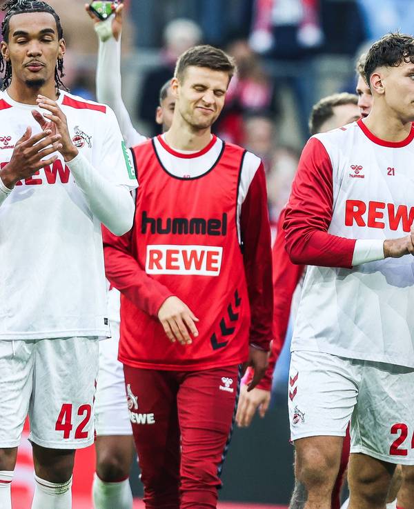 Damion Downs, Rasmus Carstensen und Julian Pauli nach einem Spiel des 1. FC Köln.