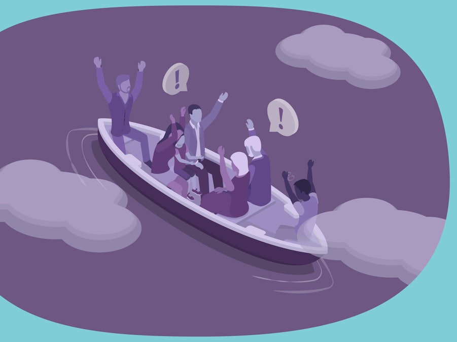 Flüchtlinge in einem Boot auf dem Meer