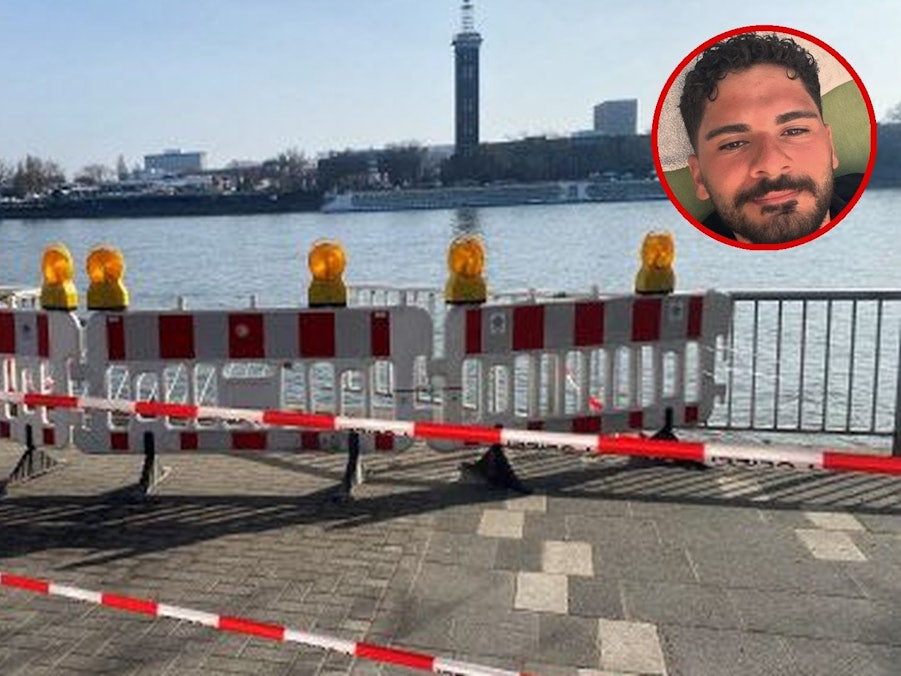 Absperr-Barken sichern eine Unfallstelle am Kölner Rheinufer