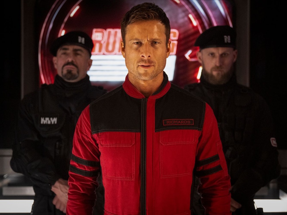 Der verzweifelte Ben Richards (Glen Powell, Mitte) stellt sich dem Spiel um Leben und Tod. (Bild: 2026 Paramount Pictures/Leonine/Ross Ferguson)