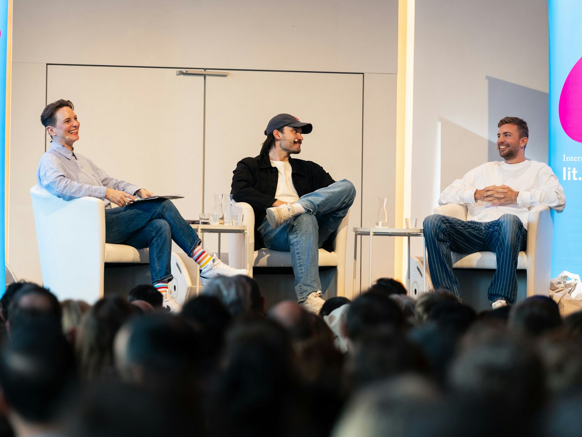 Christoph Kramer zusammen mit Rick Zabel und Okka Gundel auf der Bühne.