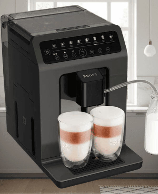 Krups Kaffeevollautomat vor einer weißen Küche im Hintergrund.