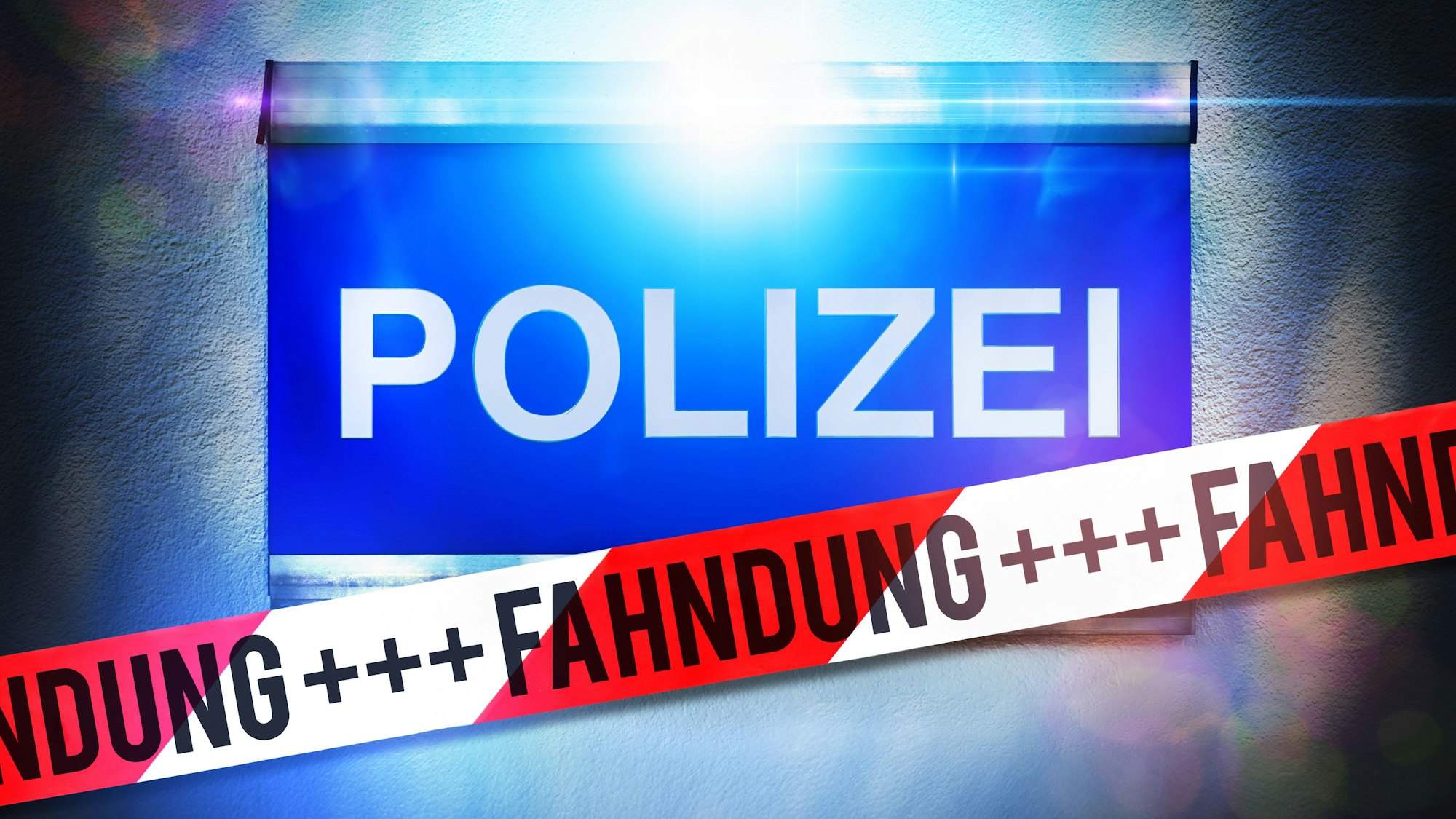 Polizeifahndung mit Blaulicht und Absperrband