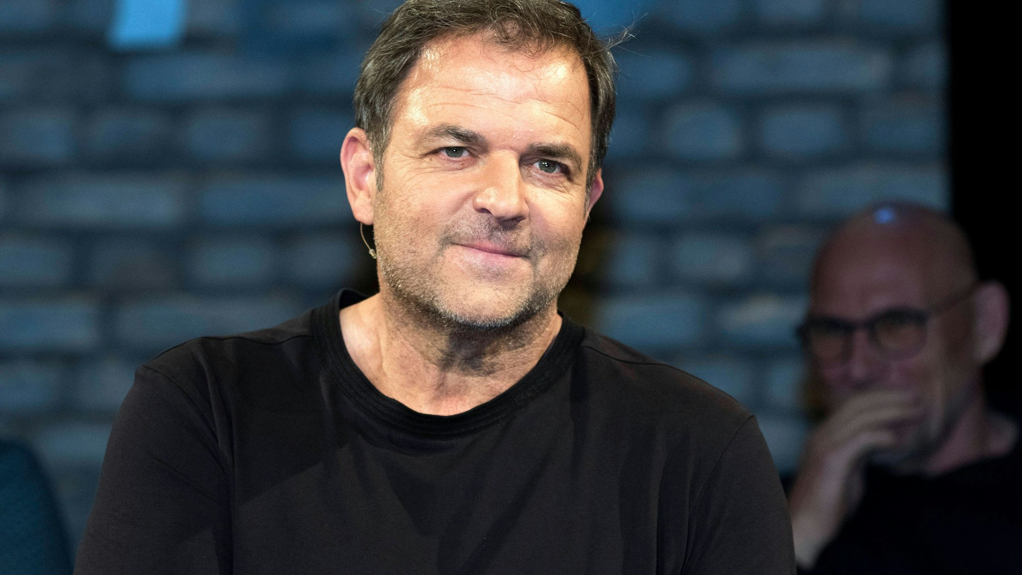 Martin Rütter, Mann in schwarzem Shirt