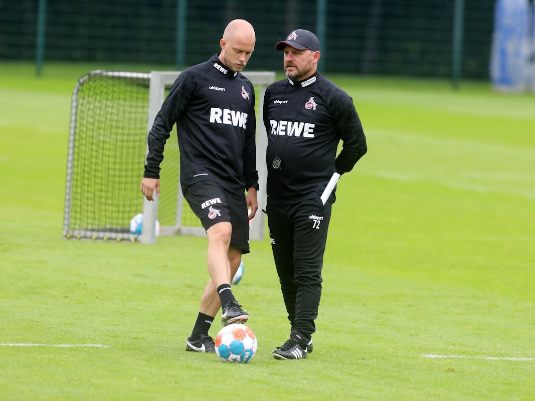 René Wagner und Steffen Baumgart beim 1. FC Köln auf dem Trainingsplatz.