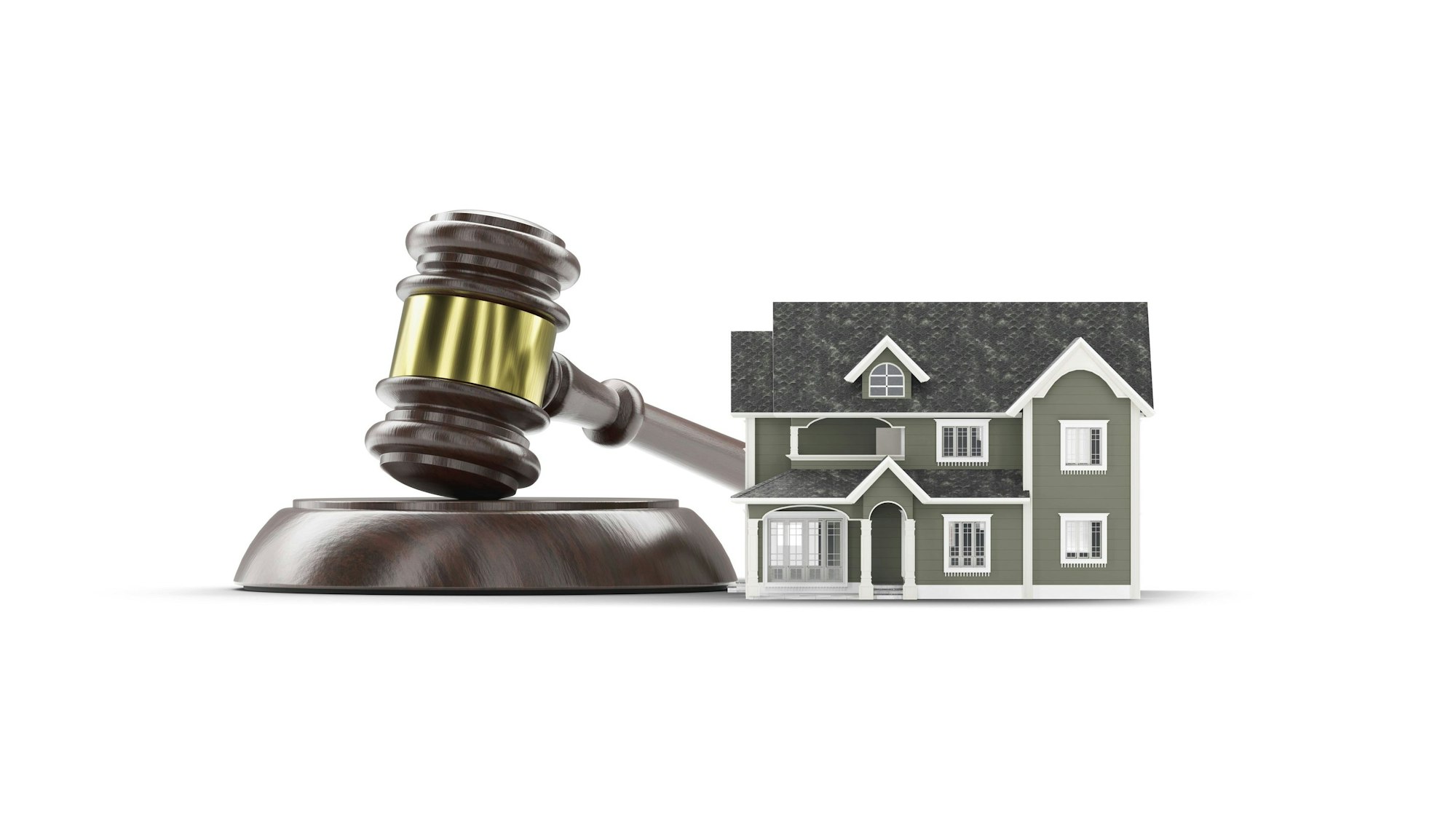 Gerichtshammer und Miniaturhaus