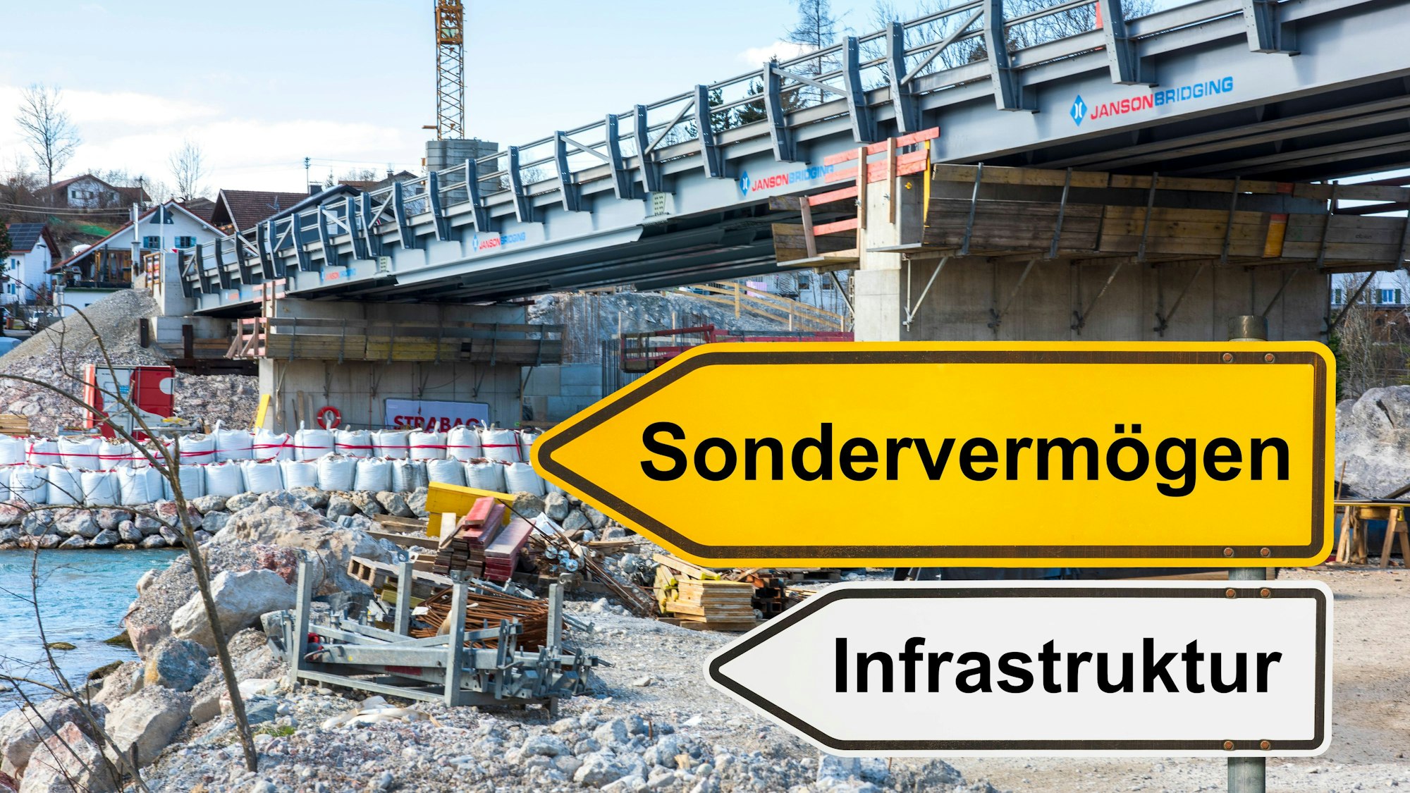 Baustelle mit Wegweiser Sondervermögen und Infrastruktur