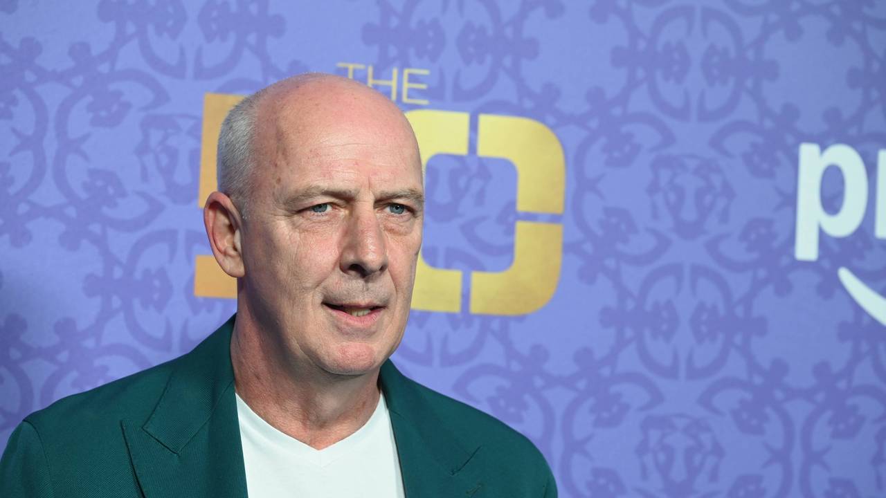 Mario Basler posiert auf dem Roten Teppich.