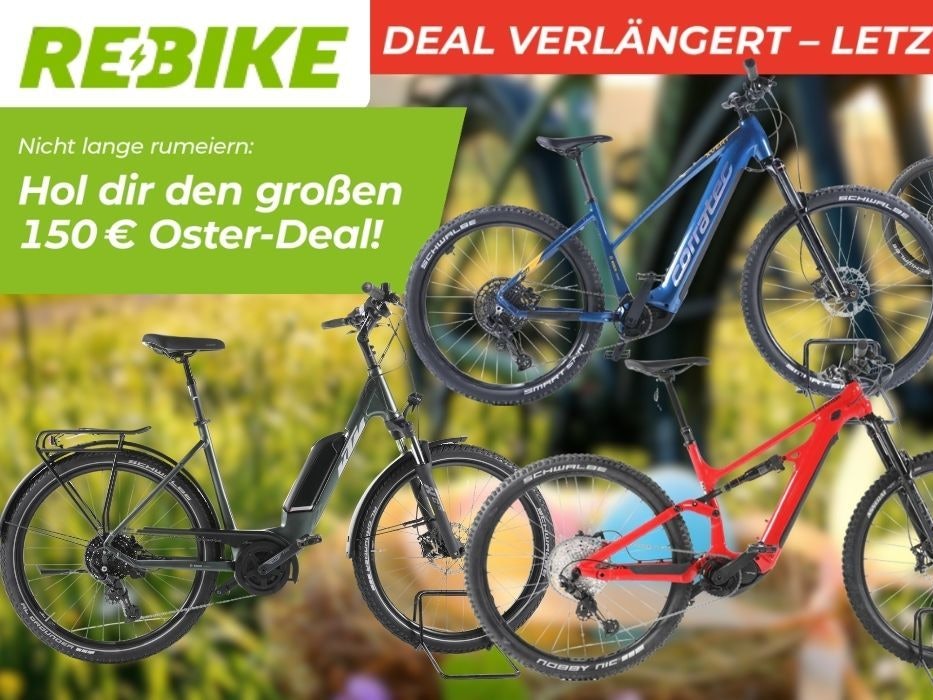 Fünf E-Bikes von Mondraker, Corratec und KTM vor frühlingshafter Osterkulisse. Rebike-Logo oben links.