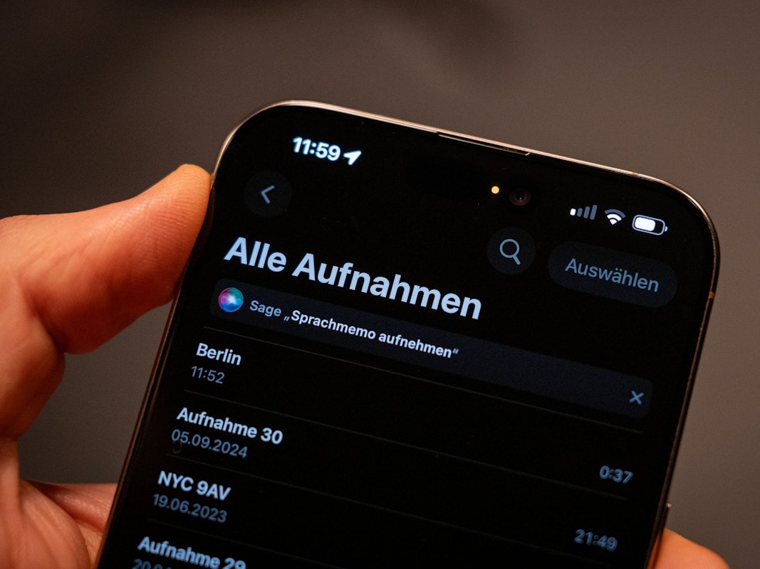 Eine orangefarbene Statusanzeige eines iPhones