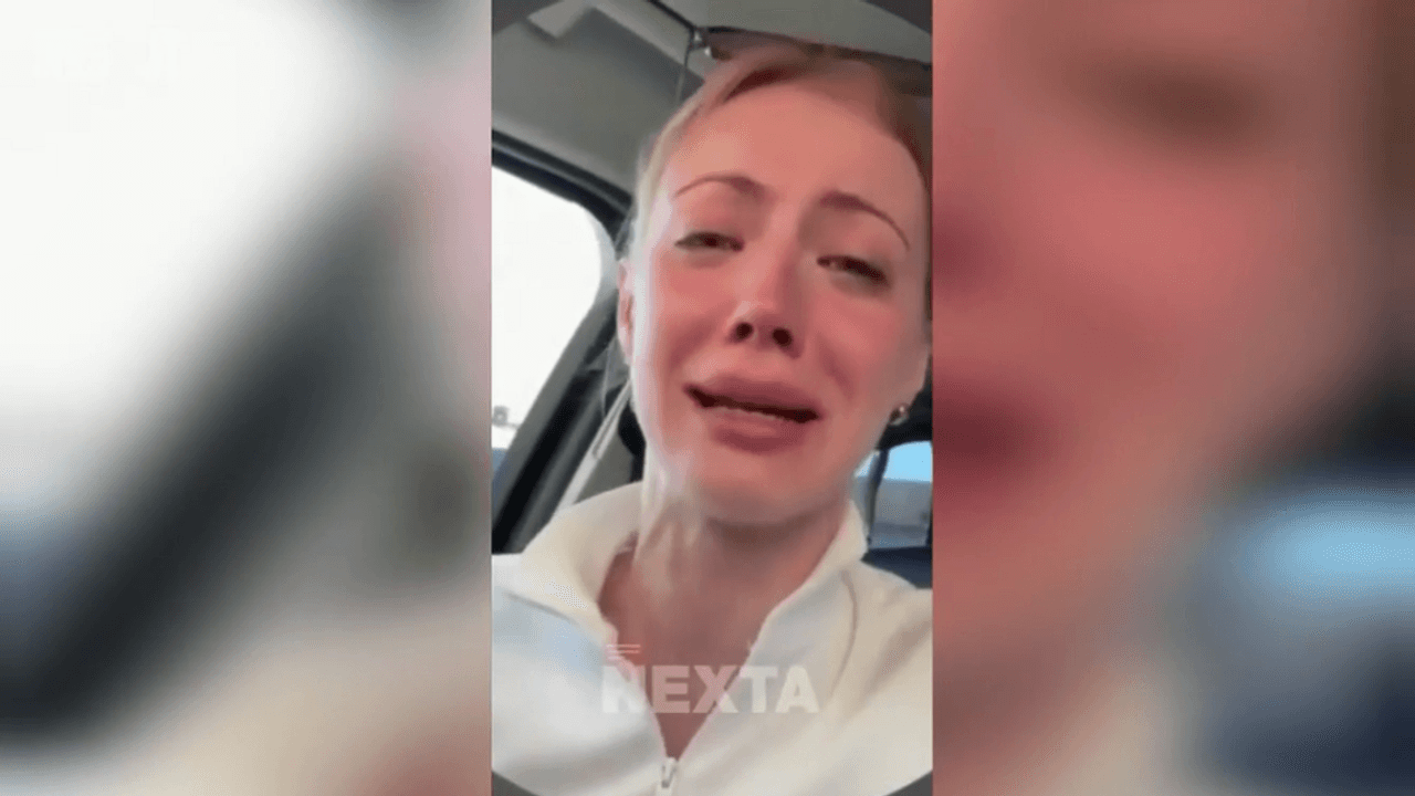 Eine Russin beklagt sich weinend über ihren unerträglichen Alltag.