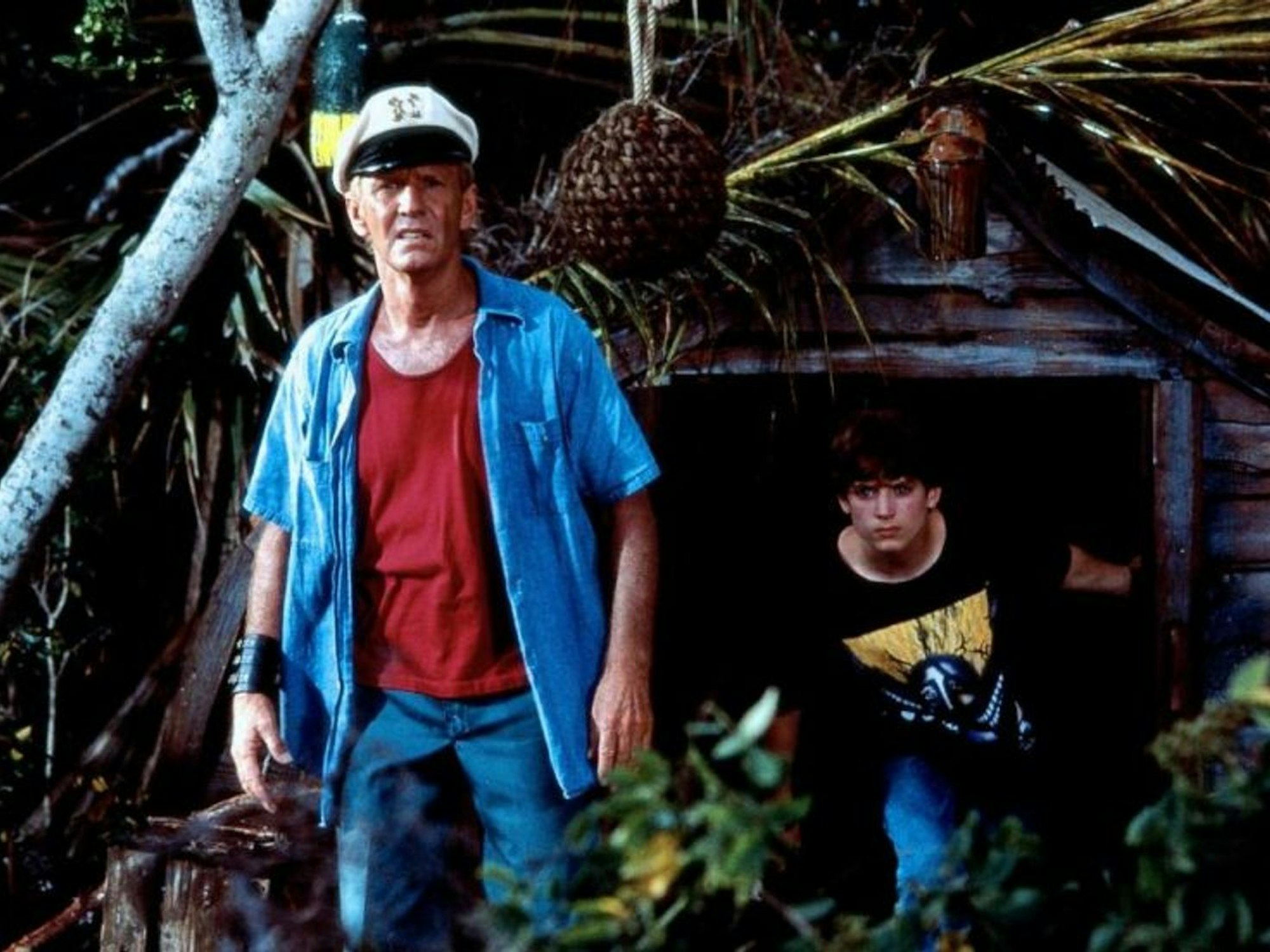 Die weitere Karriere von Paul Hogan (Bild links, mit Elijah Wood) verlief nicht sonderlich erfolgreich: Nicht nur das Remake von „Flipper“ (1996) floppte kläglich. (Bild: Universal Pictures)
