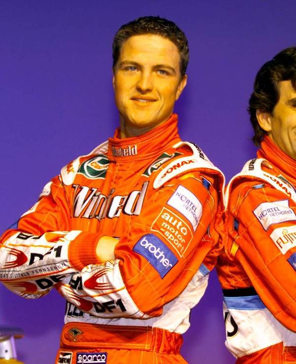 Ralf Schumacher und Alex Zanardi posieren gemeinsam für die Kamera.