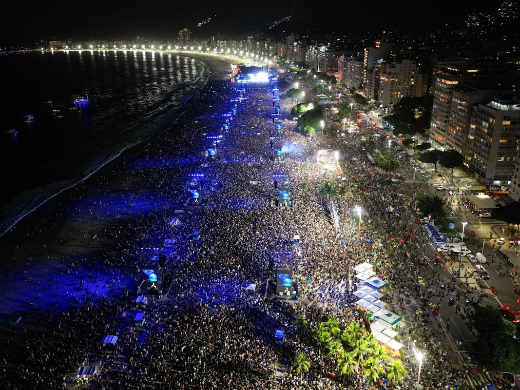 This aerial view shows Colombian singer Shakira performing during a free concert at Copacabana Beach in Rio de Janeiro, Brazil, on May 2, 2026. (Photo by Mauro PIMENTEL / AFP)